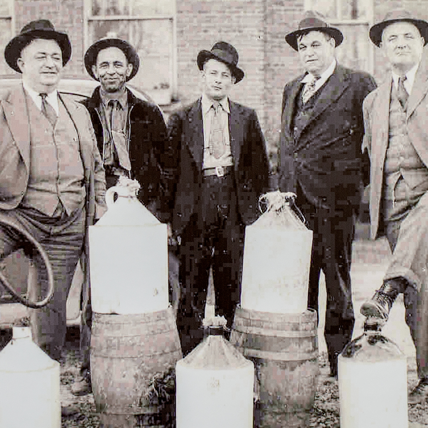 Raids of stills took place throughout the state, with authorities taking possession of the liquor, as shown in this circa-1930s photograph taken in Pickens County.