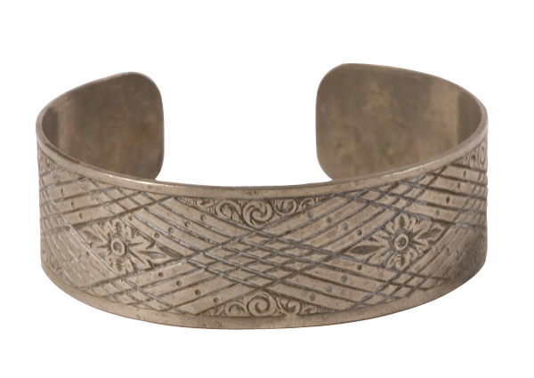 Vintage Aztec silver cuff with carved detailing, $52 at JLINSNIDER