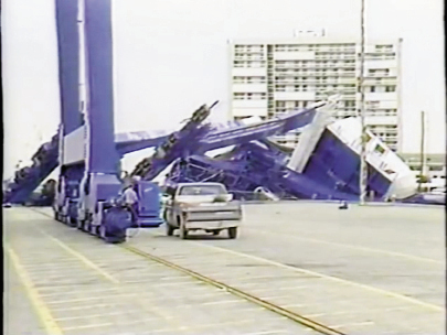 A massive crane toppled at the port