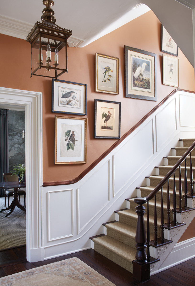 The color palette continues from the entry foyer, painted in Sherwin Williams’s Colors of Historic Charleston “Chalmers Cobblestone” with accents of “Aunt Betty’s China” from the same line.