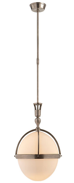 “Billy” pendant in polished nickel and white glass, $1,050, at Circa Lighting