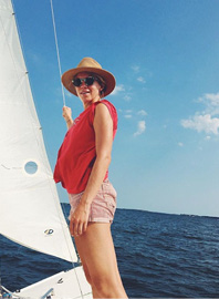 On an Off-Day:  “We love to sail. And of course, play with Oscar, our eight-month-old.”