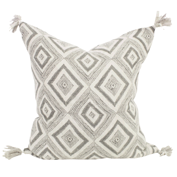 “Lattice Block” pillow, $135, at Eclectic; Walter G. “Flores Indian Teal” pillow and “Swazi Mud” pillow, $120 each, at Celadon