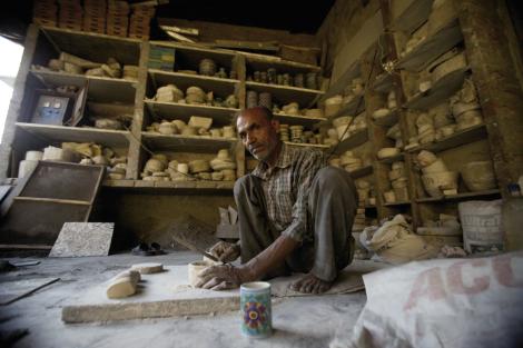 Still Life: Visiting a blue clay artisan in Jaipur, India, who, Barnhardt says, never said a word but took the time to pose for pictures: “He sat like that all day and worked nonstop, creating hundreds of cups, pots, and other items. I admired his work ethic.”