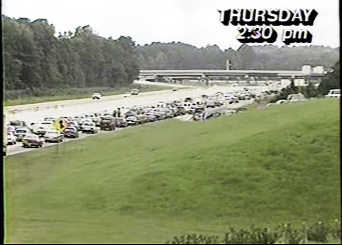 bumper-to-bumper traffic on the interstate as people evacuated inland