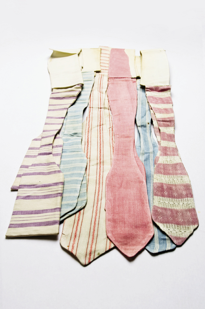 IN THE PINK All of these cotton ties hail from the early 1900s. ”Wouldn’t they be perfect with a straw boater on a summer afternoon?” asks The Charleston Museum’s curator of textiles, Jan Hiester.