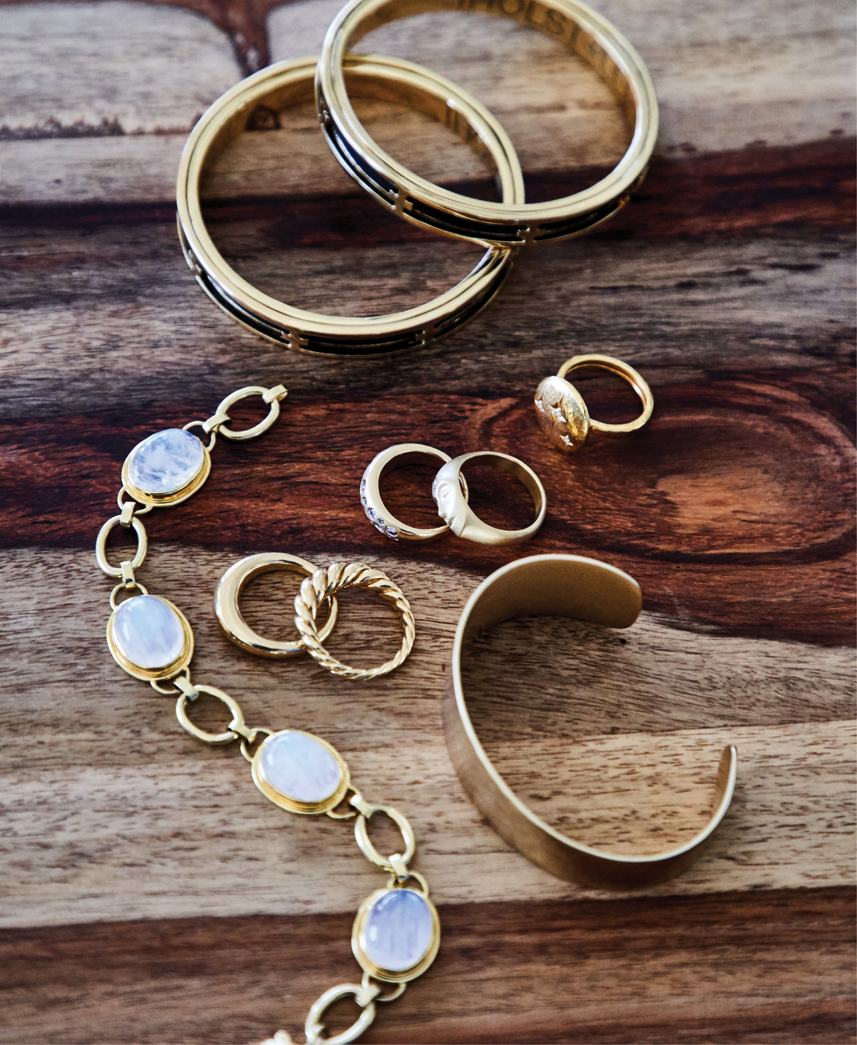 FOUND TREASURES - (Top to bottom) Holst + Lee signature bangle in “black,” $90 each at Out of Hand; Gurhan “Starlight” gold and diamond ring, $2,950 at Gwynn’s of Mount Pleasant; Anthony Lent 18K gold and diamond ring, price upon request at RTW; 18K gold and round brilliant-cut diamond ring, $2,397 at Sandler’s Diamonds &amp; Time; David Yurman 18K gold “Pure Form” stack rings, $1,900 at REEDS Jewelers; Kendra Scott 14K gold-plate “Tenley cuff,” $95 at Kendra Scott; Mazza Company 14K gold and moonstone bracelet, $4,600 at Croghan’s Jewel Box