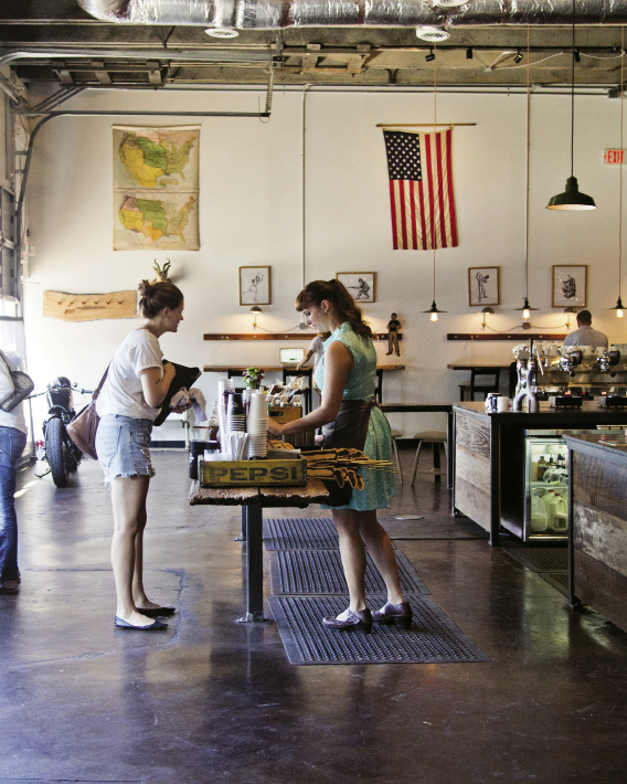 Coffee and artifacts of Americana at Barista Parlor, where vinyl records are always playing