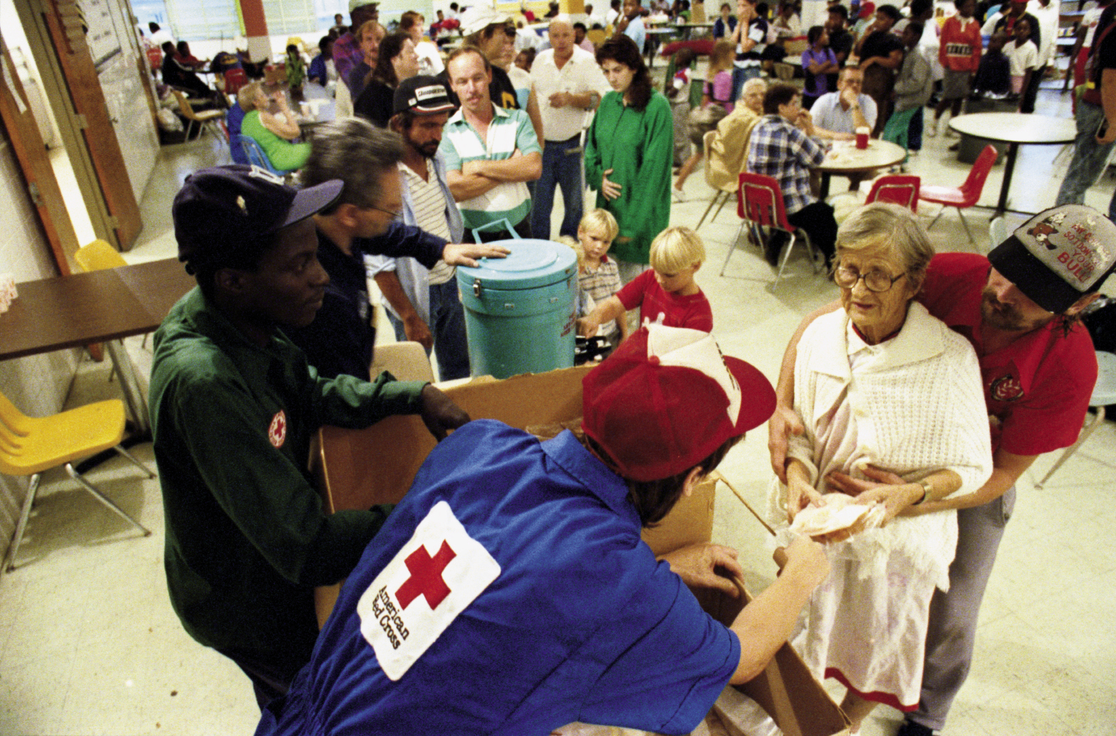 Others queued up at the American Red Cross, which provided meals in numerous shelters and on mobile feeding routes for 30 days