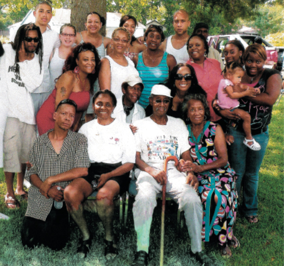 Her 79th birthday with her older brother (seated, front row) and her family