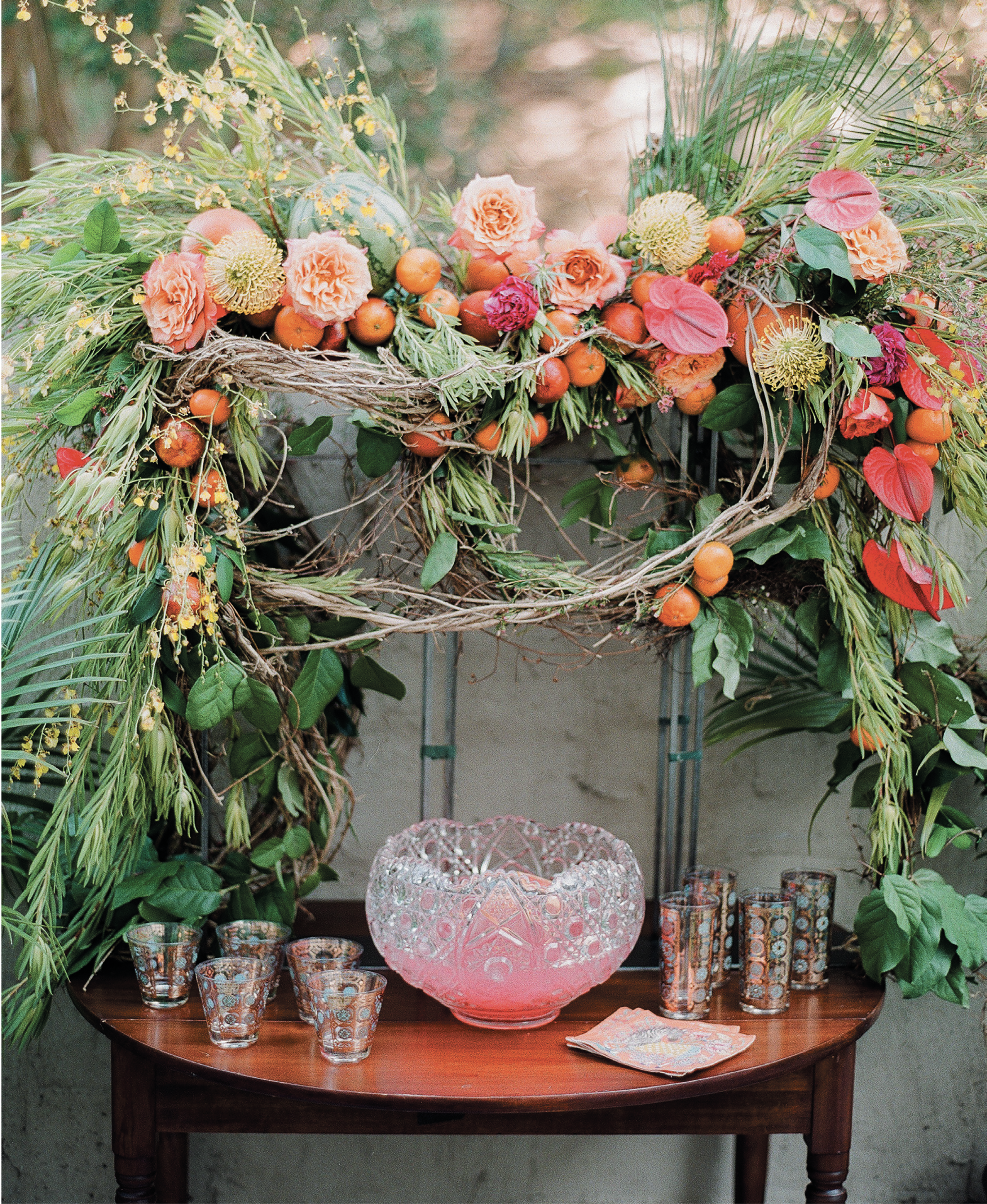 Wimberly Fair created the wow-factor floral and fruit arbor surrounding the punch table.