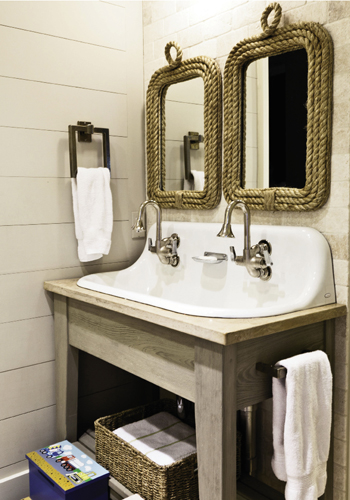 Jack-and-Jill bath with a vintage-style hanging wall sink.
