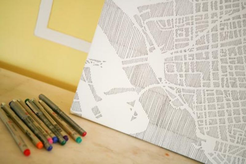 SIGN ME UP: A pen and ink drawing of downtown Charleston served as the sign-in “book” for guests, who wrote well wishes in colored pens.
