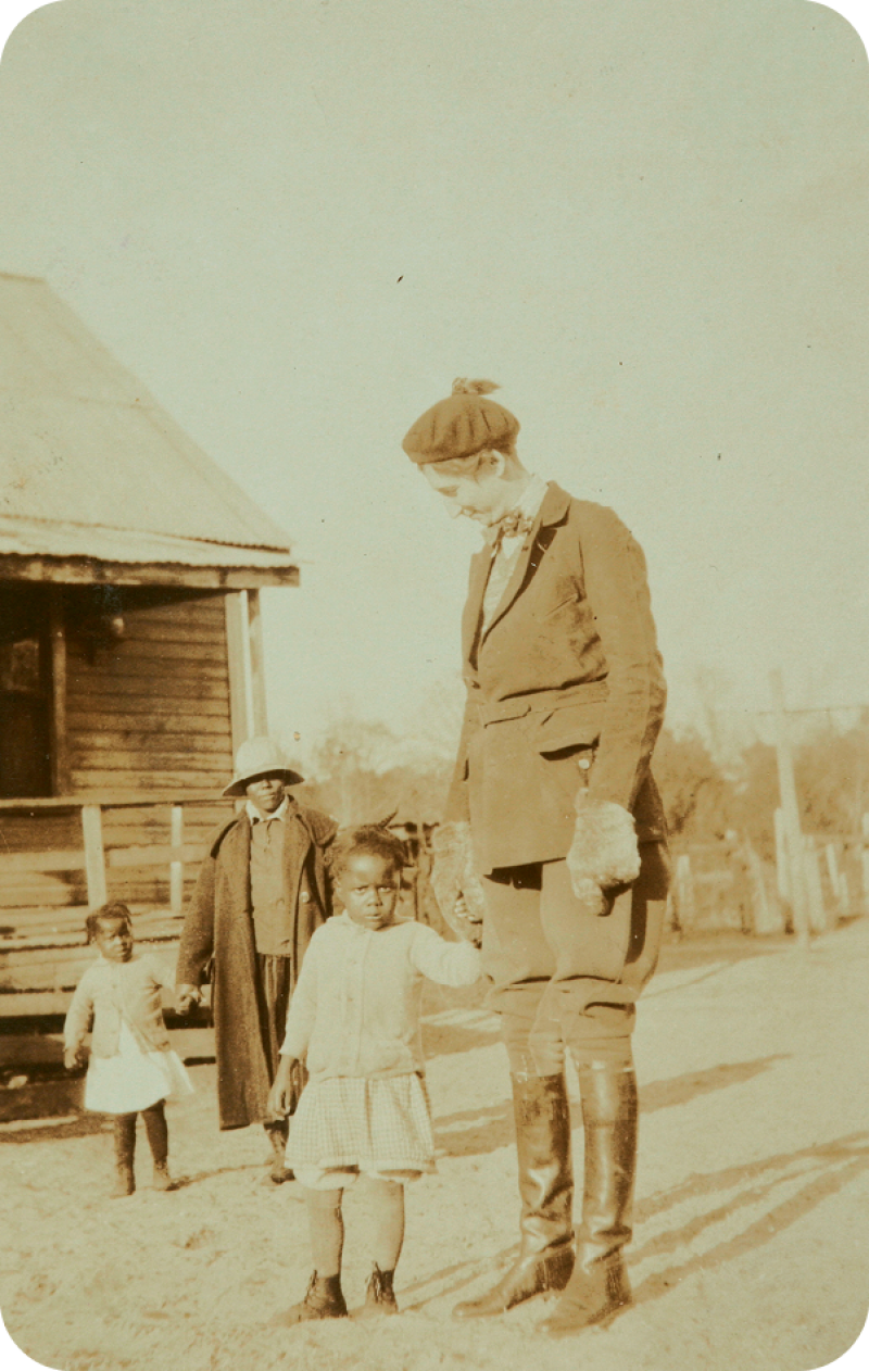 Belle with students in Hobcaw’s Strawberry Village,  circa 1930.