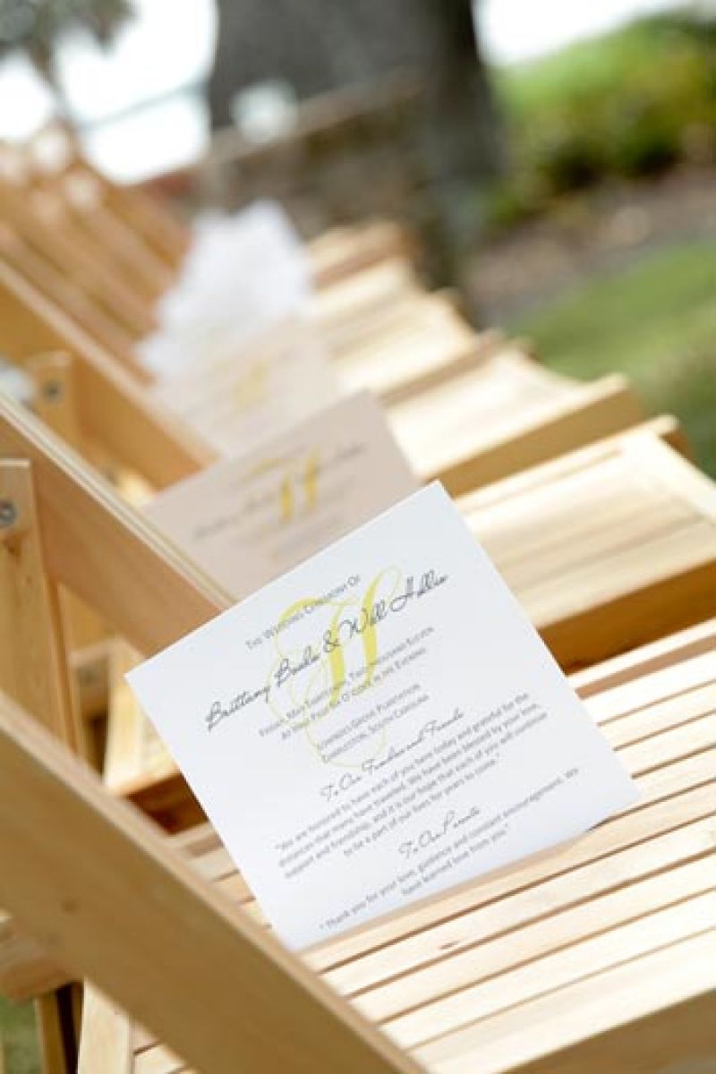 SUITES AND SEATS: Scotti Cline Designs crafted ceremony programs that coordinated with the color scheme.