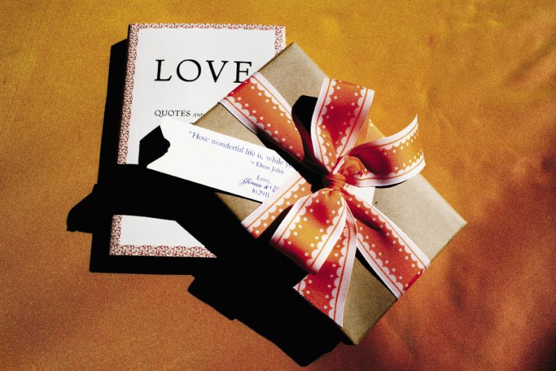 WORD  FOR WORD: As a nod to Jessica’s career as  a writer, guests were given a book of the bride’s favorite love quotes.