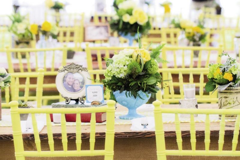SNAPSHOT: Each table featured a portrait of the couple.