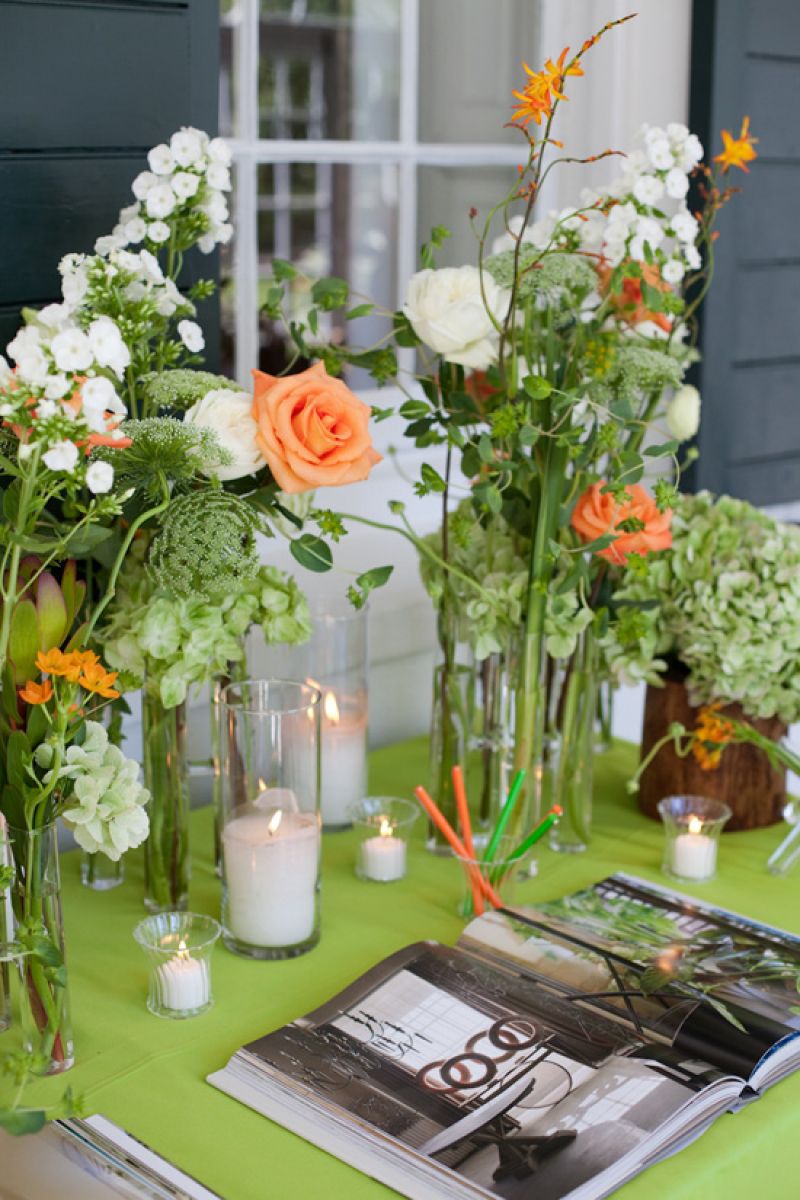 LETTER PERFECT: Flower arrangements and flickering candles made the book signing station “warm, gorgeous, and inviting,” says Tyler.