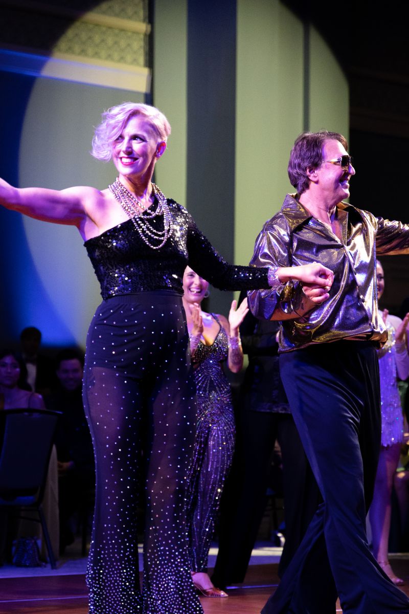 Maddie Kenner and partner Dr. John Rink perform a cha-chacha to Earth, Wind &amp; Fire’s “Let’s Groove.”