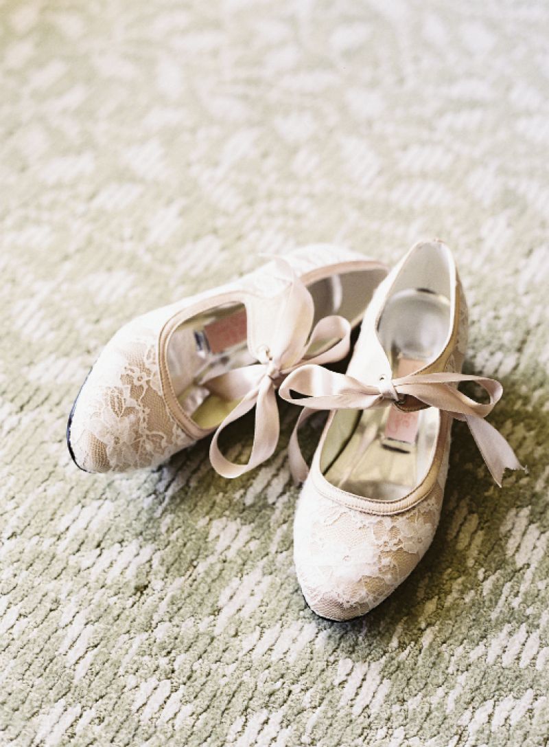 HEAD TO TOE: The bride wore old-fashioned wedding shoes with satin laces custom-made by British company Bespoke Big Day.