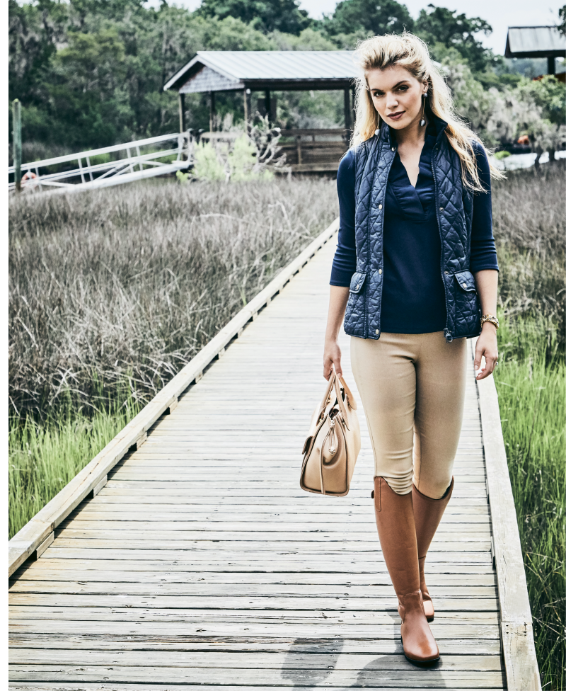 Vest Dressed - Gretchen Scott jersey “Ruffneck” top in “navy,” $99, and Gretchen Scott spandex pant, $109, both at Gretchen Scott; Barbour “Otterburn Gilet” vest in “navy,” $129 at M. Dumas &amp; Sons; Modern silver ball drop earrings, $38 at Tara Grinna Swimwear; estate 14K gold, sapphire, and pearl bracelet, $8,500 at Croghan’s Jewel Box; Sommer “Athen” tall leather boots, $300 at Bits &amp; Pieces.