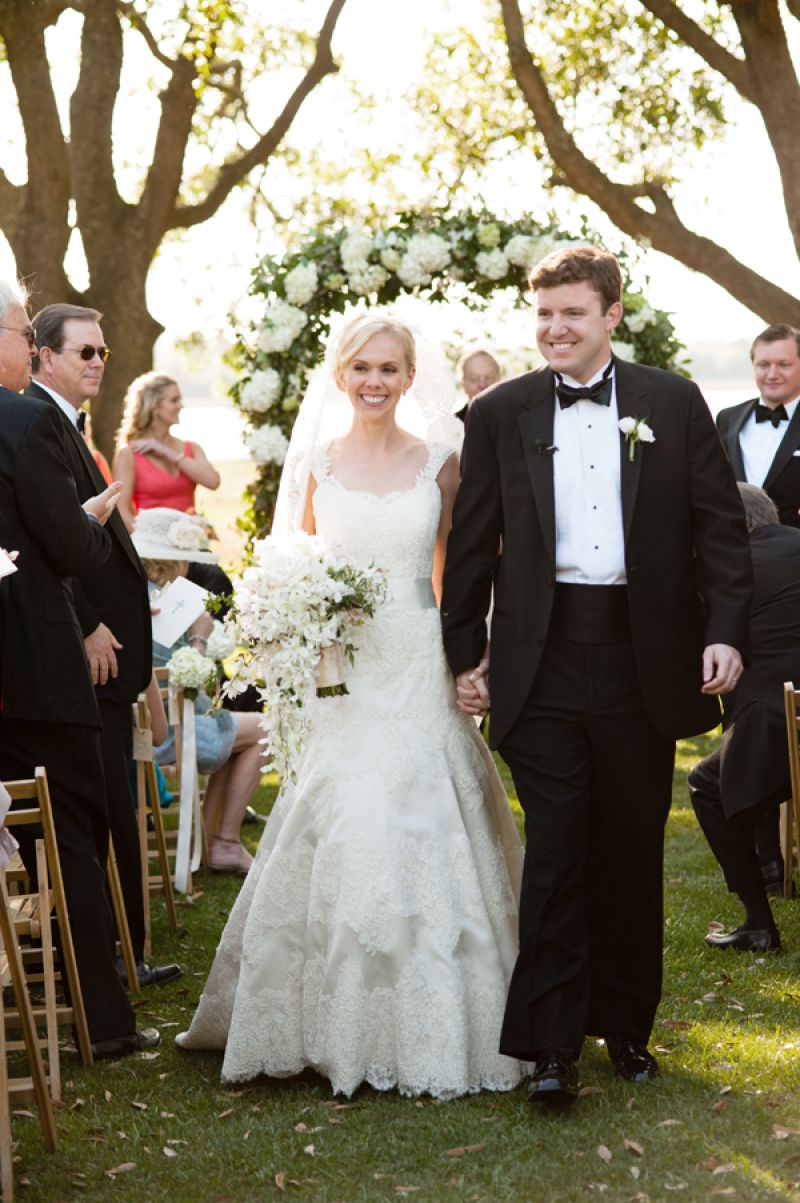 MR. AND MRS.  David’s classic suit complemented Anna’s lace Anne Barge gown.