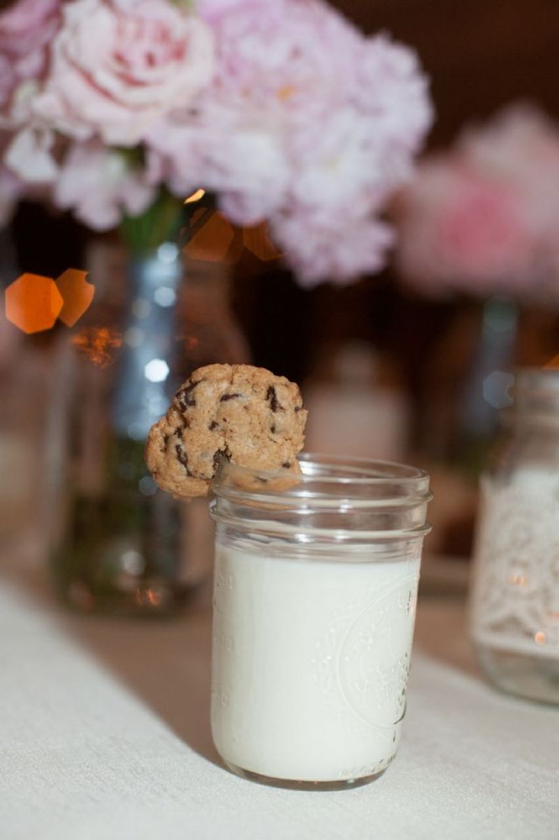MIDNIGHT SNACK: The bride and groom surprised guests with a late night treat of milk and chocolate chip cookies served in Mason jars.