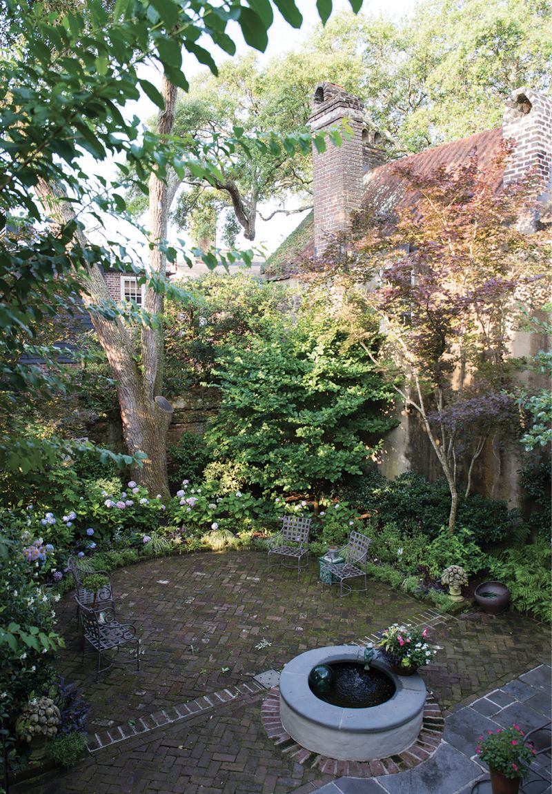 Great Bones - Originally conceived by noted garden designer Loutrel Briggs, this horseshoe-shaped courtyard was refreshed in 2010 with more of the traditional flora Briggs would have most likely used, such as hydrangeas and azaleas. Other plantings ensure something is blooming year-round, be it foxglove in the spring or camellias in the cooler months.  Location: Downtown, South of Broad (circa-1951 and -1961 Loutrel Briggs-designed garden, owned by Monica and Ken Seeger) Issue: April 2017, “Open-  Door Policy”  Photographer: Katie Charlotte