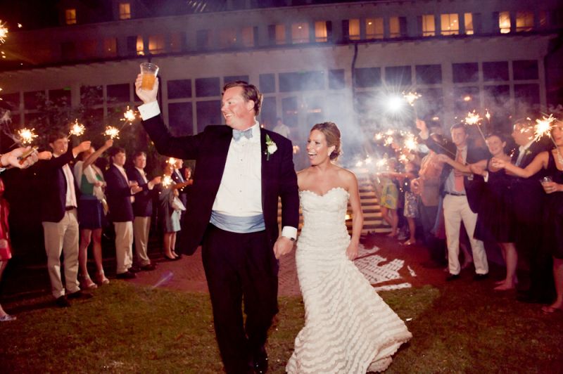 CHEERS! The newlyweds—who shared a first dance to Frank Sinatra’s “The Way You Look Tonight”—departed amid guests’ sparklers.