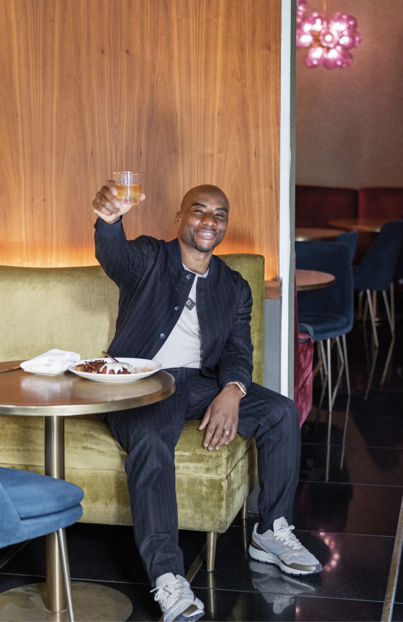 Raising a glass at Bourbon N’ Bubbles, his friend Lamar Bonaparte’s King Street bar and restaurant.