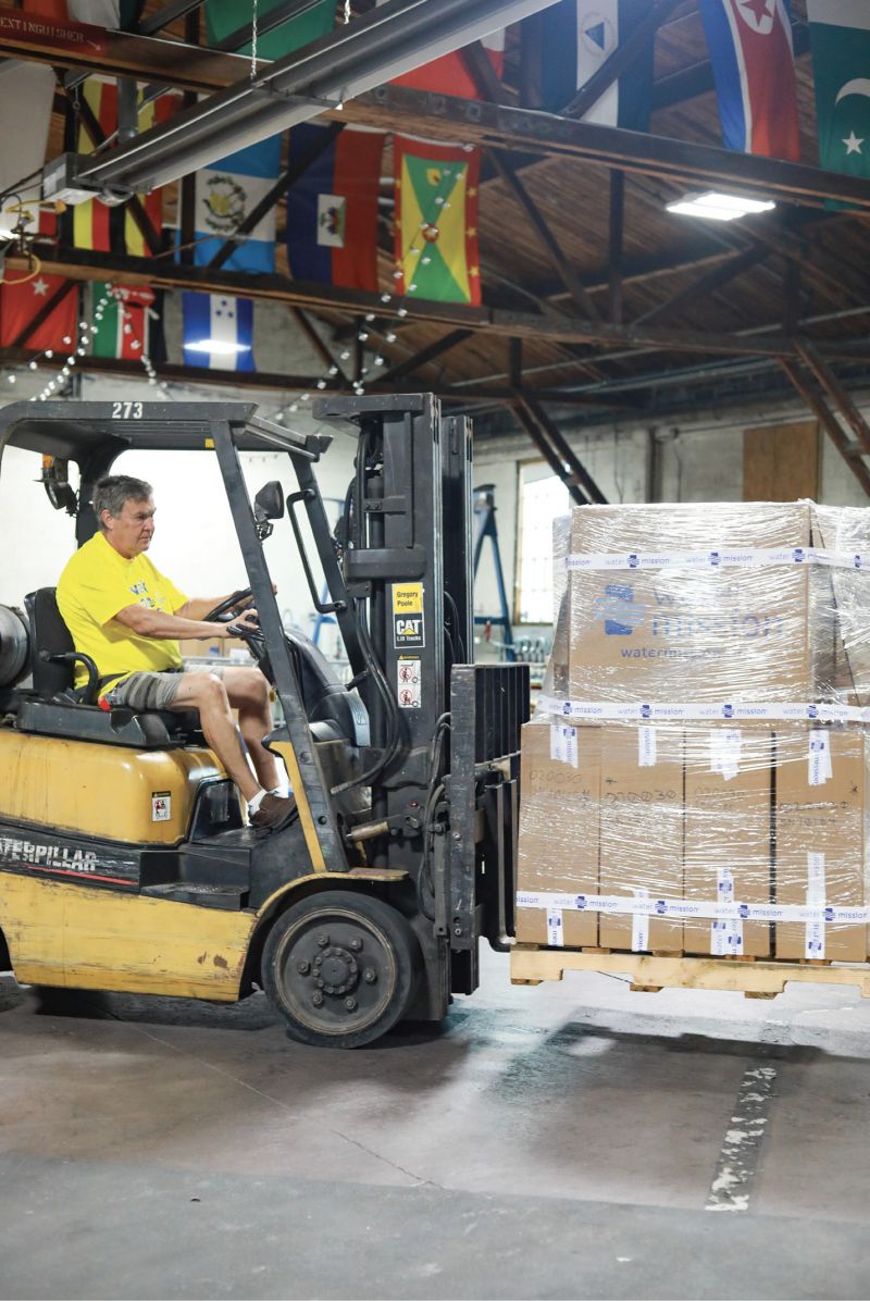 Volunteers also package completed systems and maintenance parts for shipment around the world.
