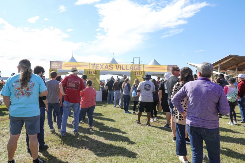 Lining up for the Texas Village to try offerings from Cody Sperry of Hoodoo Brown BBQ, Patrick Feges and Erin Smith of Feges BBQ, and Charleston’s Lewis Barbecue.