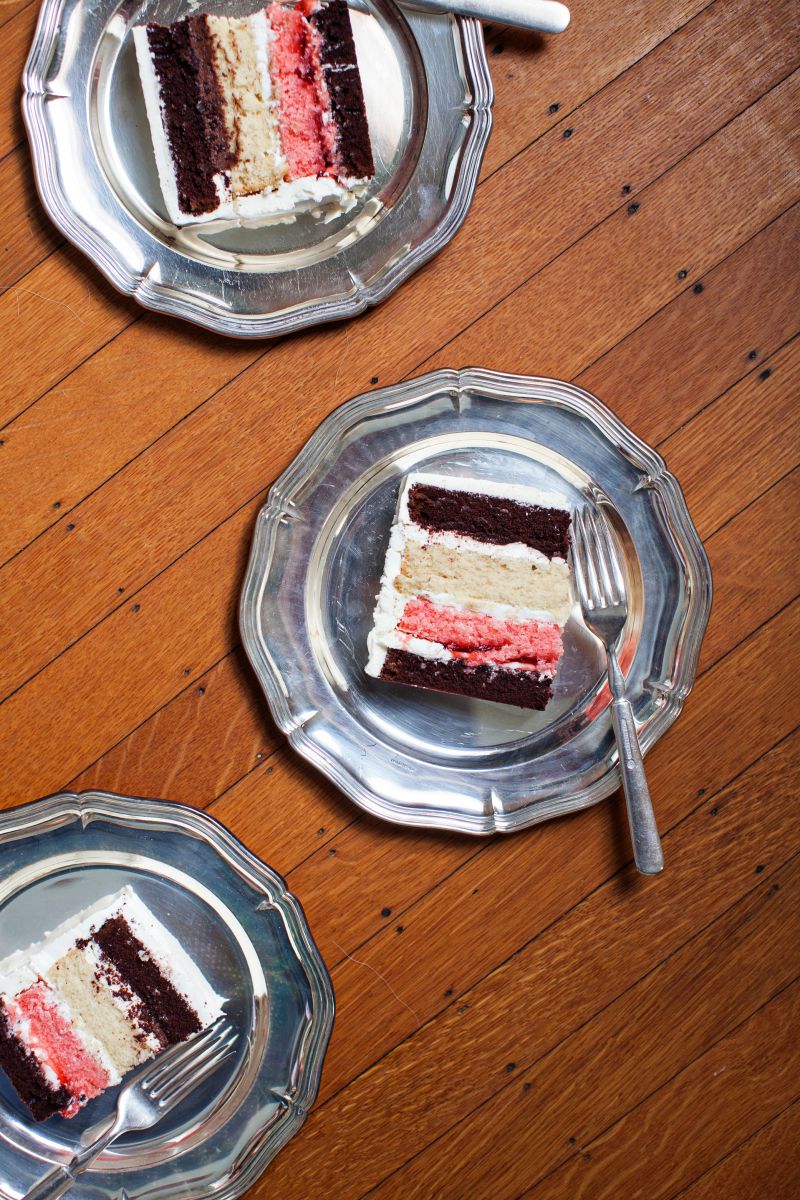 Tammy layered strawberry, vanilla, and chocolate cake for a Neapolitan effect.