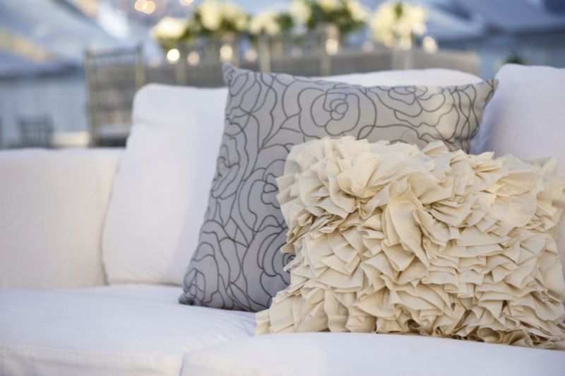 FINISHING TOUCHES: A Charleston Bride brought in textured elements, like these throw pillows, to add variety to the mostly gray color palette