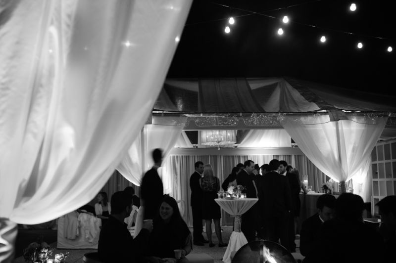 UNDER THE STARS: Charleston’s mild weather allowed guests to mingle either in the tent or al fresco.