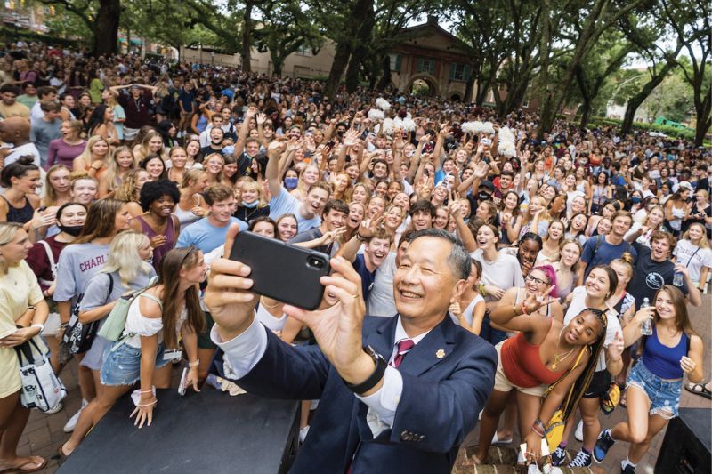President Hsu takes a selfie with incoming students on Admitted Student Day in February 2022. Renowned for his relatability, as well as his love for music, he further connects with students by sharing a playlist with them each semester before finals. (Find a link at the end of the feature.)