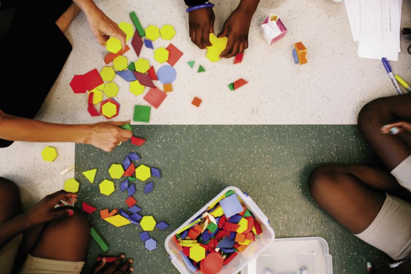 A nest at Memminger works on its Circle Game activity, which is used to weave in weekly learning objectives.