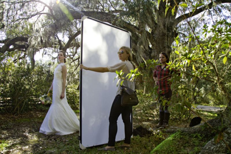Molly Hutter, the new Weddings mag ed assistant pitches in with a little photo assisting.