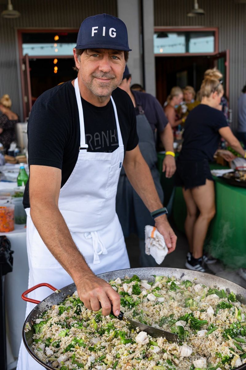FIG and The Ordinary chef/co-owner Mike Lata prepares vegetable and fish fried rice made with local ingredients from Abundant Seafood, Anson Mills, and Spade &amp; Clover Gardens.