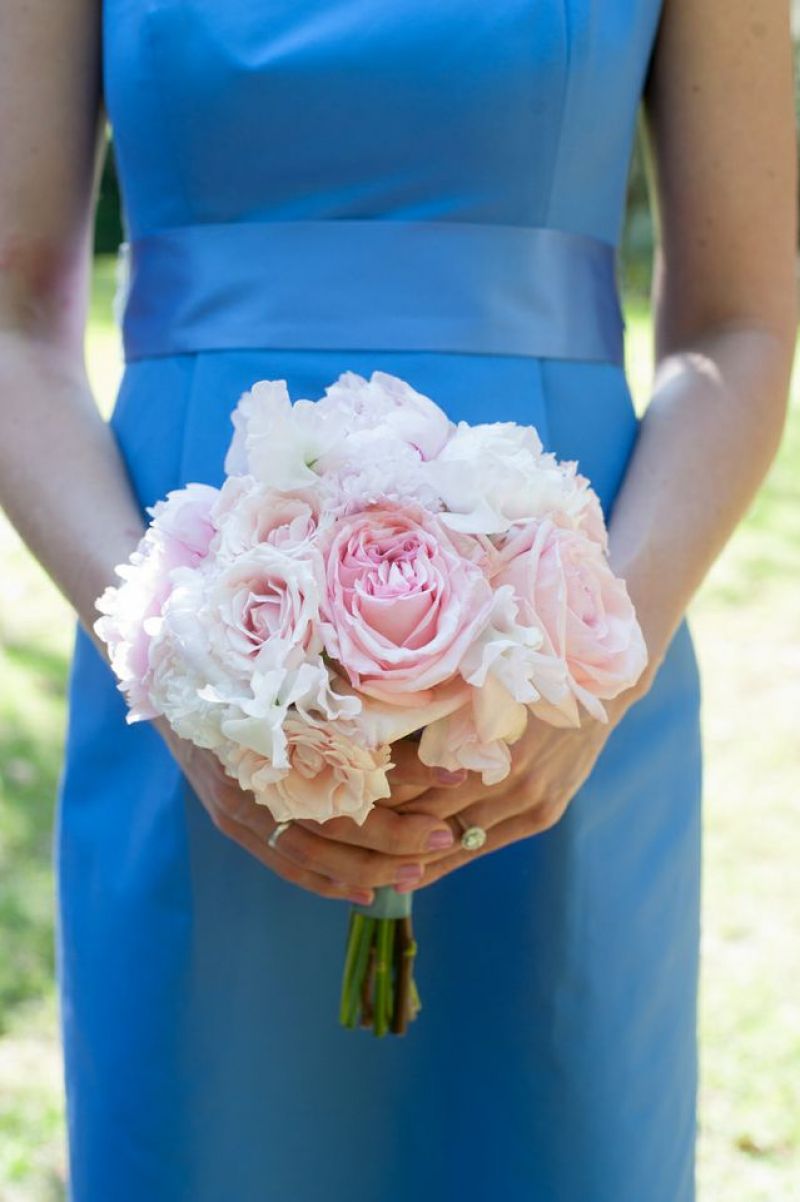 COLORFUL CONTRAST: Pink peonies stood out against the bridesmaid’s J.Crew frocks. Of the wedding’s color palette D’Anne says, “I wanted something soft and romantic, yet a bit unpredictable.”