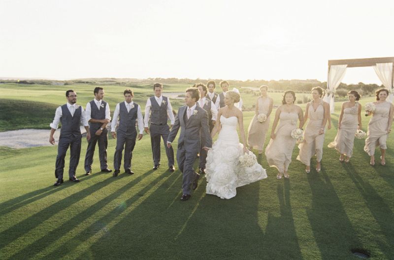 GIVING THANKS: The bridal party was gifted with vintage hairpins and earrings to accent their champagne-colored frocks by Bari Jay. Groomsmen, in Express, received designer wallets.