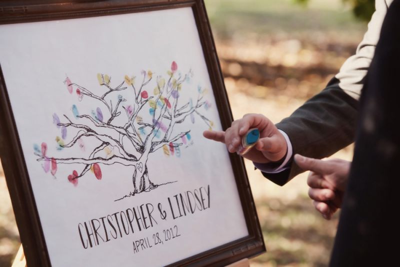 TREE OF LIFE: In lieu of a traditional guestbook, the nature-loving duo had family and friends stamp their fingerprints and names on a customized tree canvas.