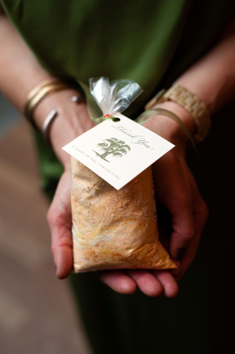 GIVING THANKS: Guests took home a bag of grits, each with a note from the happy couple (which Anna attached herself).