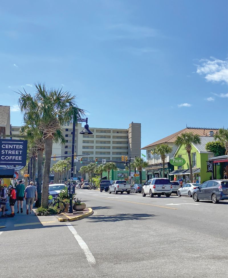 Shops, restaurants, and people line Center Street, the heart of Folly that ends at the Atlantic Ocean.