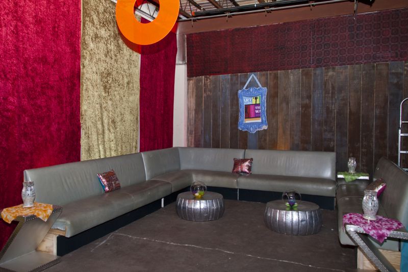 Guests relaxed in a stylish &#039;60s lounge, complete with inflatable wall art.