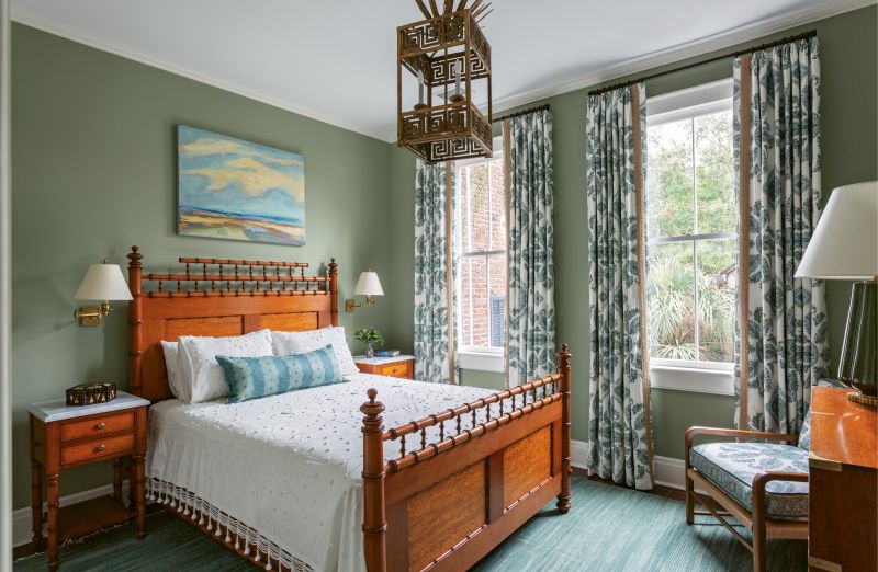 CURTAIN CALL: Playful patterns set the tone in the guest rooms with bohemian Peter Dunham Textiles “Samarkand” curtains.