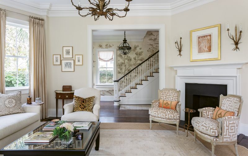 The homeowners scoured local galleries for art, selecting the Otto Neumann monotype from Anne Long Fine Art for a modern touch above the mantel and the Alfred Hutty and Elizabeth O’Neill Verner etchings on the far wall as a nod to local history.