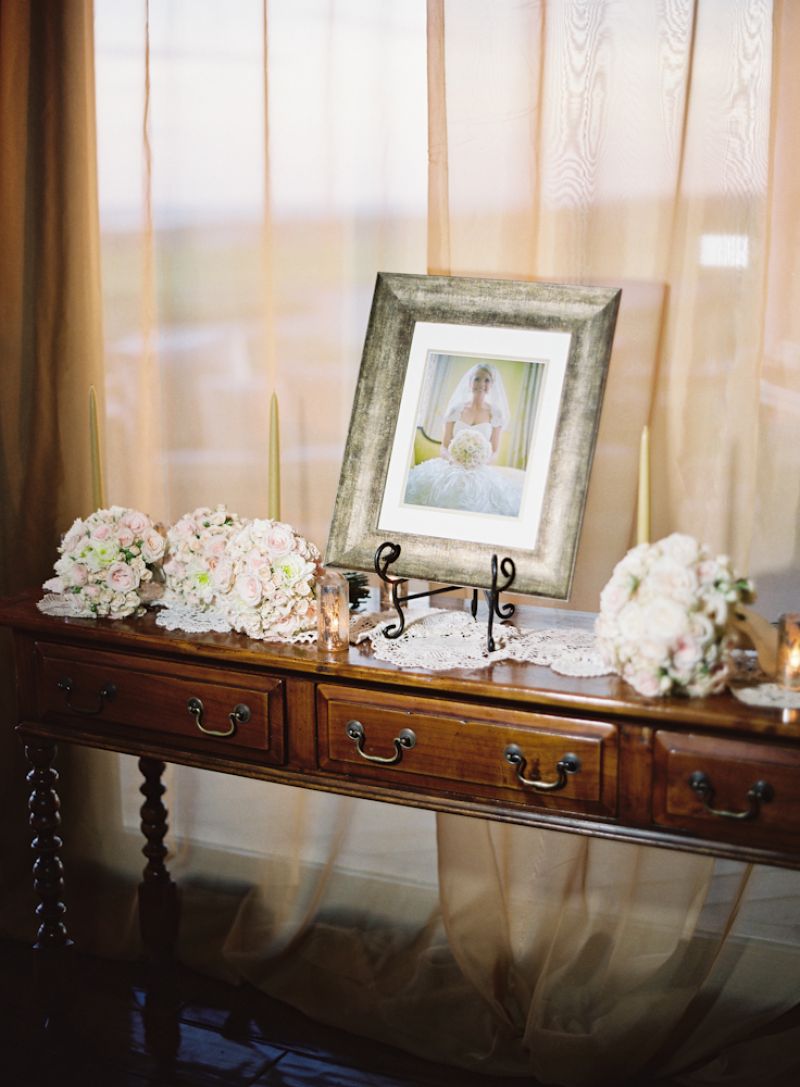 BUSY BEE: Crystal took on the project of finding classic antique frames to display each photo.