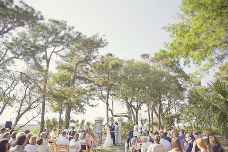WHAT A VIEW: Tiffany and Benjamin’s ceremony and reception overlooked the Folly River, held behind the Viewpoints house on Folly Beach.