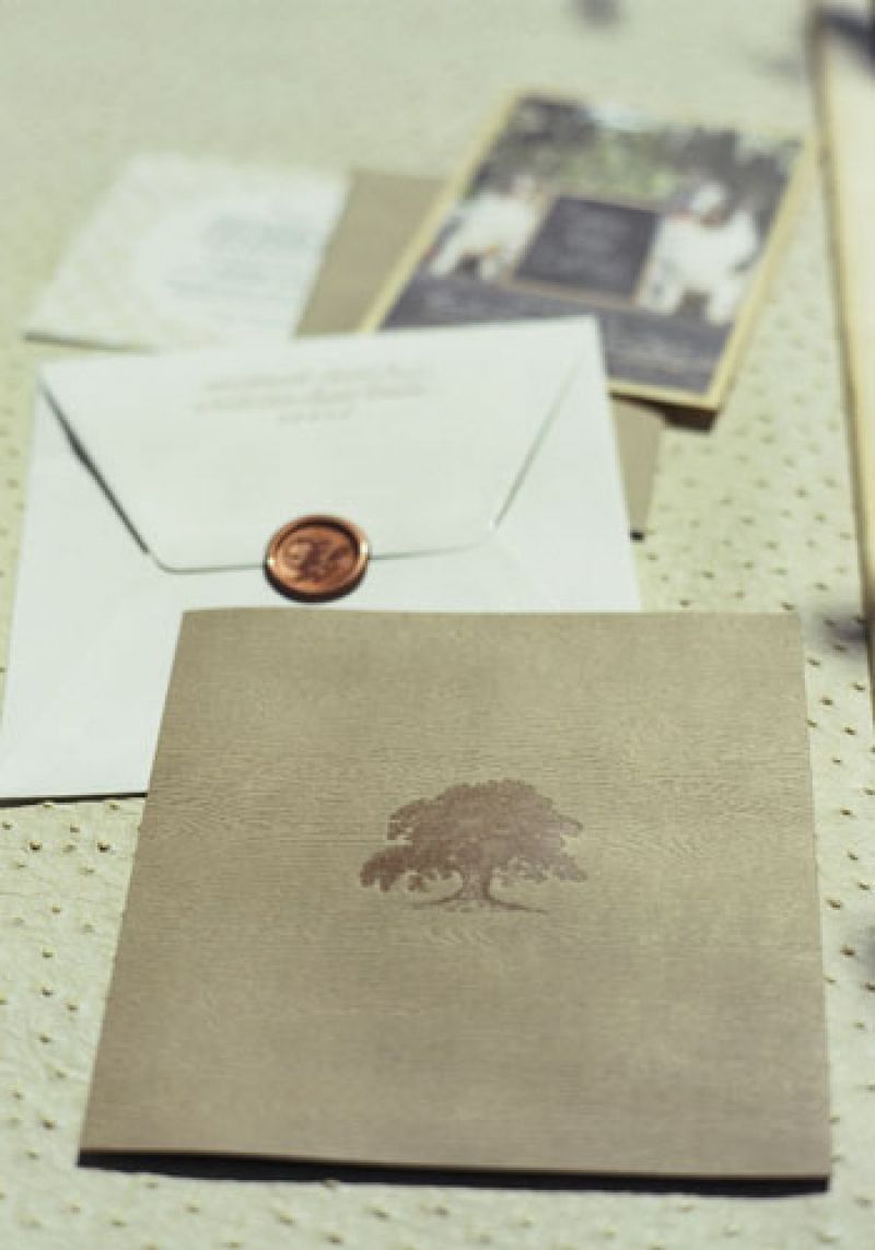 Stamp of Approval: Images of live oaks appeared on the invitations, programs, and etched glasses.